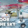 2 wingsuit flyers BASE jump into a plane in mid-air. | A Door In The Sky - Vanvittige basejumpers i wingsuits hopper fra bjerg og ind i et fly
