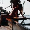 Stilfuldt fotoshoot med modeller på sejltur i Bali