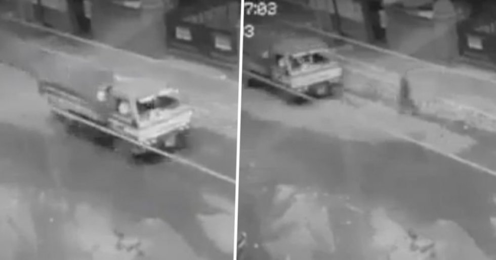 Spøgelse fanget på overvågningskamera gående over en trafikeret vej