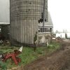 Man knocks down silo with sledge hammer - Redneck-renovering