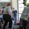 Fat guy falling off dance machine - fail! - 'Got the moves like Jagger'