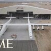 See The World's Biggest Airplane Roll Out For The First Time | TIME - Verdens største fly har et vindefang på 117 meter, 28 hjul og 6 motorer