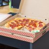 Pizza Hut medarbejder fyret for at skrive sjofel besked på pizzaæsken 