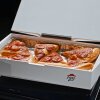 Foto: Pizza Hut - Pizza Hut har designet gadget, der luner din pizza med varmen fra din PlayStation 5